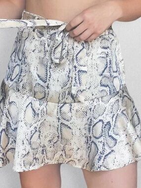 NWOT Altar’d State snake-print tie-waist mini skort. Size XS